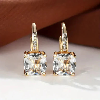 Gold hoop Earrings with mystery Stones.