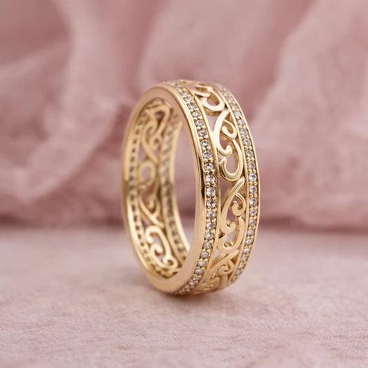 Shiny Gold Ring with Openwork Details.
