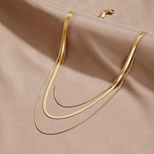 Multilayered gold chain necklace