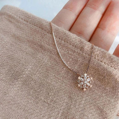 Crystal necklace with sparkling snow in gold and silver.