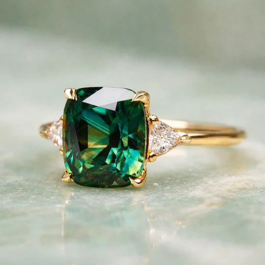 Elegant Ring with Green Stone.
