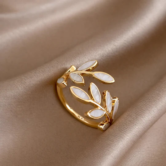Ring with White Opal set in Gold Leaf.