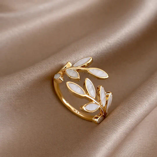 Ring with White Opal set in Gold Leaf.