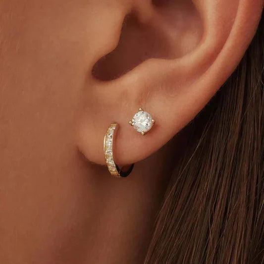 Dara Brillant earring set with stones.